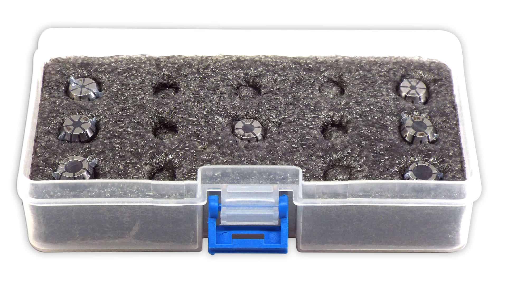 Precision machine tool accessories with adjustable dials in a storage box for machining and manufacturing.