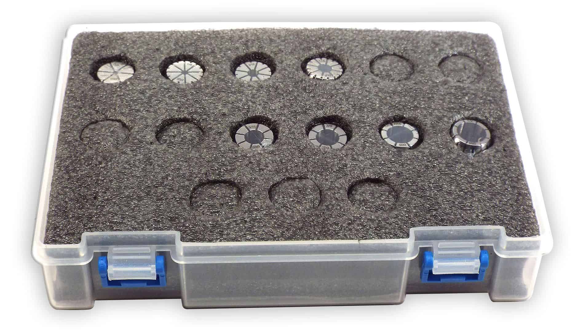 Precision watch bezel removal tool set in foam storage case, ideal for watchmakers and jewelry repair, featuring multiple sizes of bezels and movement spacers for watch maintenance.