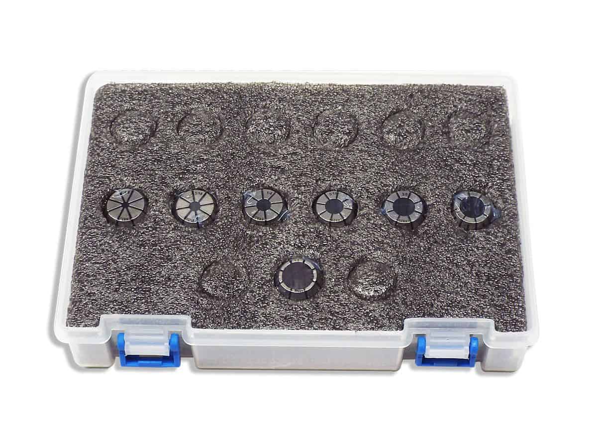 Precision dial indicator gauge set in clear storage box for accurate measurements.