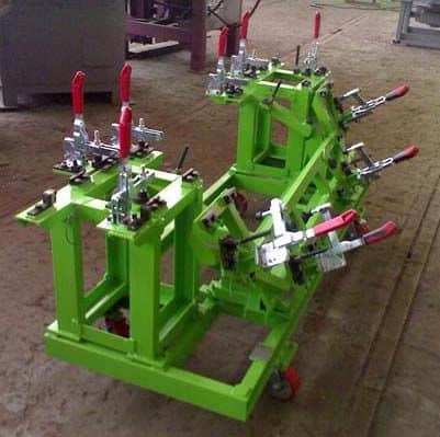 High-quality green woodworking clamps display heavy-duty construction, adjustable handles, and versatile clamping capacity, ideal for woodworking and carpentry projects.